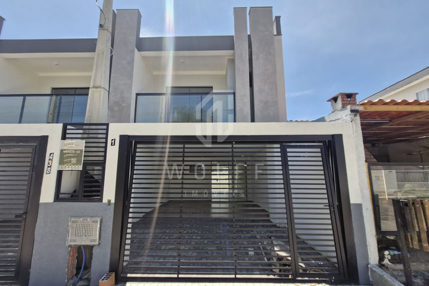 JD1154 - Genebra - Sobrado Geminado com Área de Fundos