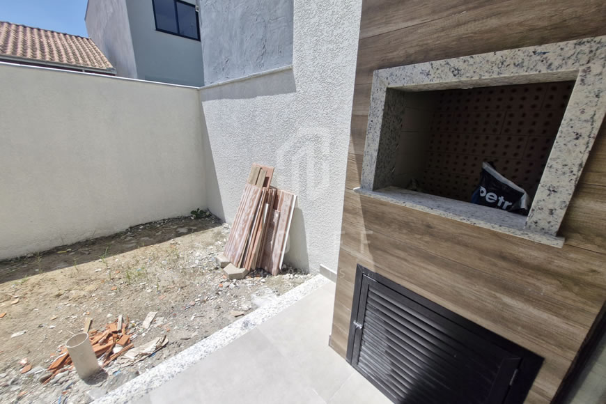 JD1154 - Genebra - Sobrado Geminado com Área de Fundos