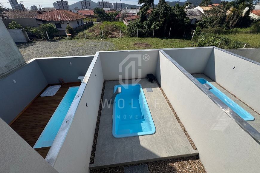 JD1401 - Sobrado Geminado com Ótimo Padrão de Acabamento