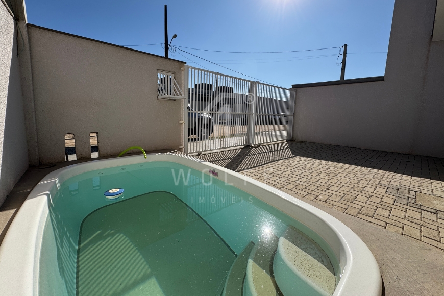 JD1603 - Sobrado com Piscina e 02 suítes em Itajuba