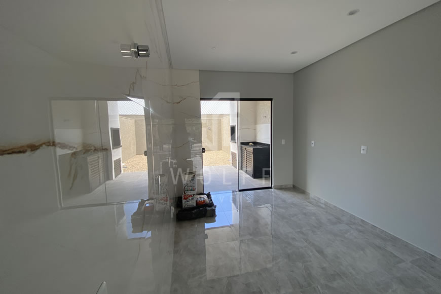 JD1607 - Casa Geminada Aconchegante com Área Externa nos Fundos