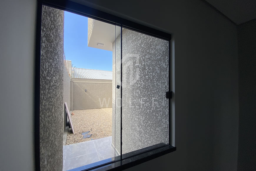 JD1607 - Casa Geminada Aconchegante com Área Externa nos Fundos