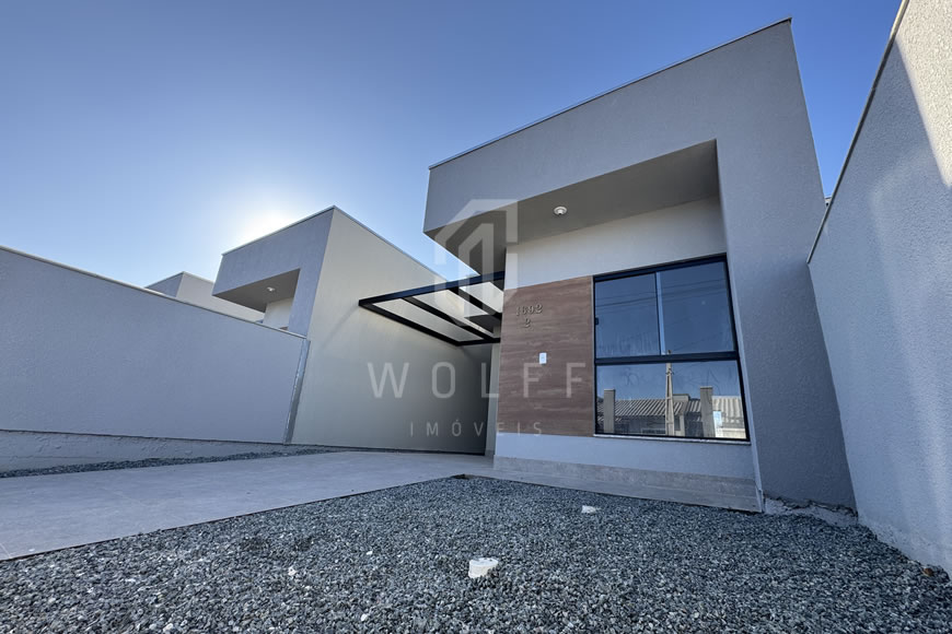 JD1612 - Casa Geminada com Passagem Lateral e Fachada Moderna