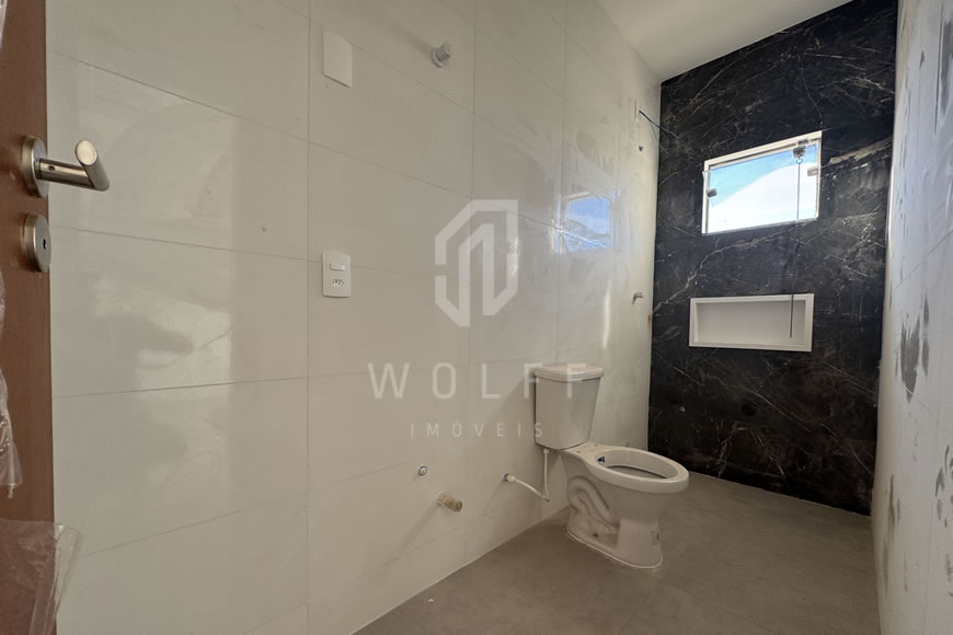 JD1612 - Casa Geminada com Passagem Lateral e Fachada Moderna