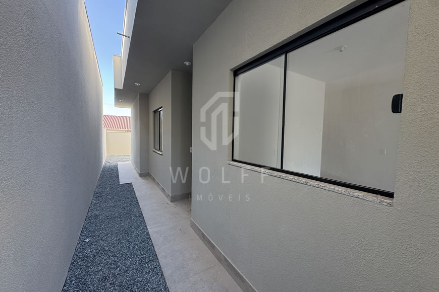 JD1612 - Casa Geminada com Passagem Lateral e Fachada Moderna