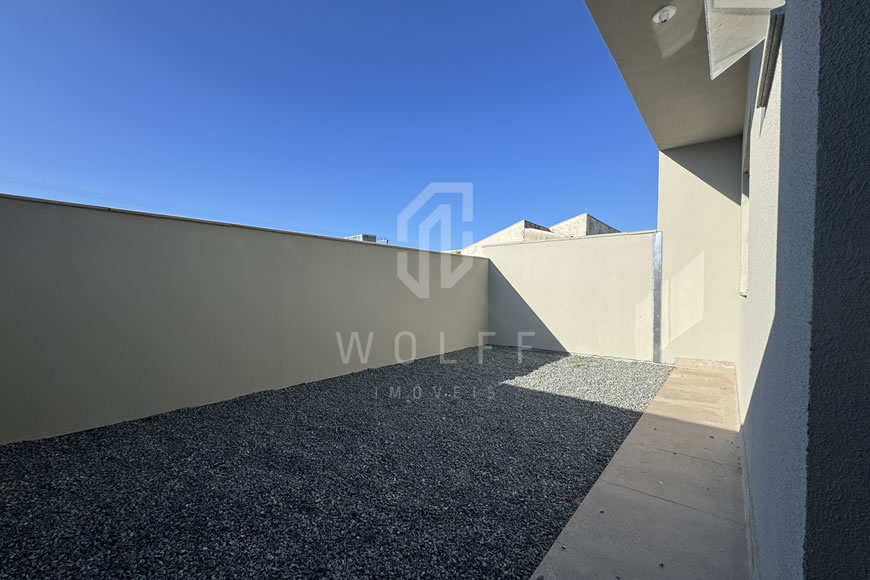 JD1612 - Casa Geminada com Passagem Lateral e Fachada Moderna