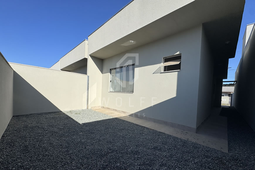 JD1612 - Casa Geminada com Passagem Lateral e Fachada Moderna