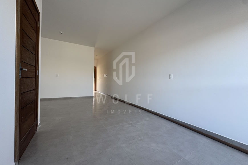 JD1612 - Casa Geminada com Passagem Lateral e Fachada Moderna