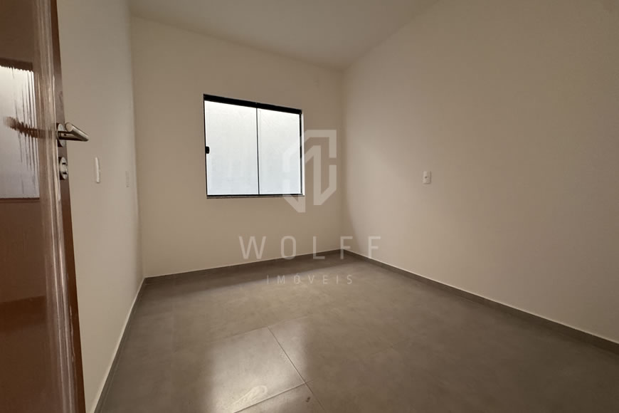 JD1612 - Casa Geminada com Passagem Lateral e Fachada Moderna