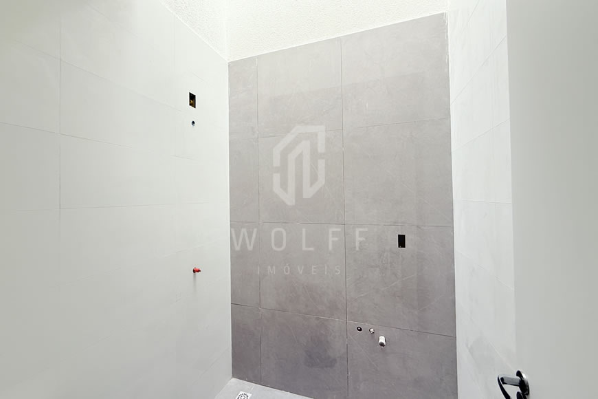 JD1622 - Casa Geminada com Ótima Localização em Rua Pavimentada