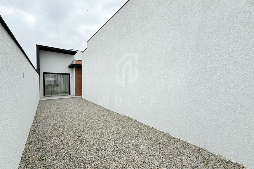 JD1622 - Casa Geminada com Ótima Localização em Rua Pavimentada