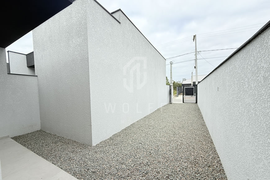 JD1622 - Casa Geminada com Ótima Localização em Rua Pavimentada