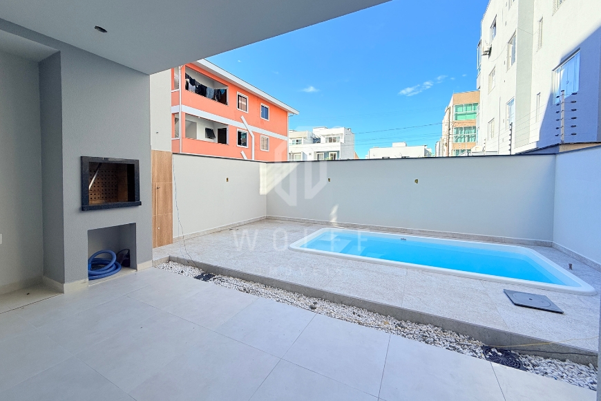 JD1628 - Sobrado Geminado a apenas 150m da Praia
